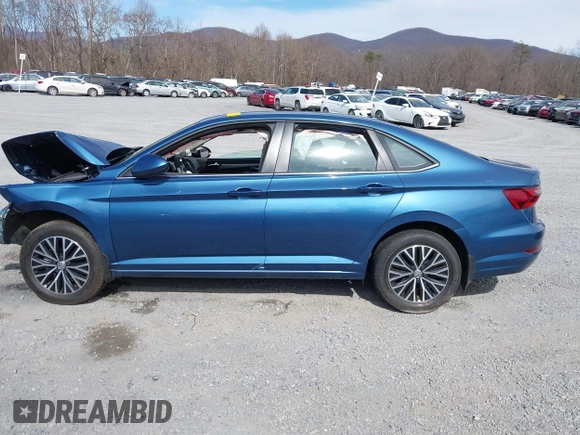 2021 Volkswagen Jetta S z VIN 3VWC57BU0MM084554, wystawiony jako IAAI lot #41859293 z przebiegiem Nie podano mil oraz . Historia ofert i sprzedaży dostępna na DreamBid. Obrazek 13.