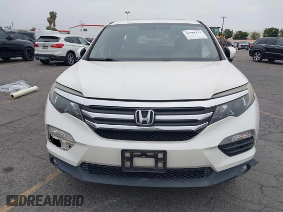 2016 Honda Pilot EX-L with VIN 5FNYF5H54GB037742, listed as a IAAI auction lot 41988112 with 68,459 mi miles and . Bid and sale history available at DreamBid. Image 12.