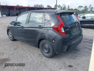 2016 Honda Fit LX with VIN JHMGK5H59GS002090, listed as a IAAI auction lot 41761887 with 97,577 mi miles. Bid and sale history available at carsss.com. Image 3.