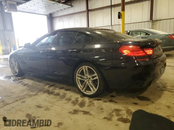2015 BMW 6 Series 640i xDrive z VIN WBA6B8C58FD453159, wystawiony jako Copart lot #88931285 z przebiegiem 145 656 mil mil oraz Szkoda całkowita • Salvage title. Historia ofert i sprzedaży dostępna na DreamBid. Obrazek 2.