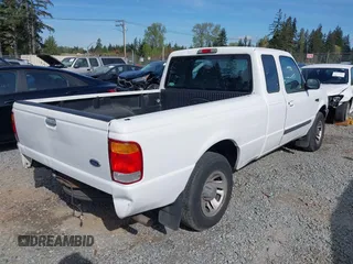 1999 Ford Ranger XLT with VIN 1FTYR14X0XPA65325, listed as a IAAI auction lot 42009611 with 218,657 mi miles. Bid and sale history available at carsss.com. Image 4.