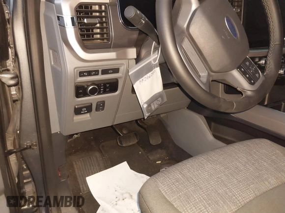 2023 Ford F-150 Lightning Pro z VIN 1FTVW1EL8PWG48559, wystawiony jako IAAI lot #41566599 z przebiegiem 8 830 mil mil oraz . Historia ofert i sprzedaży dostępna na DreamBid. Obrazek 22.