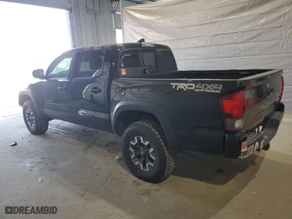2019 Toyota Tacoma 4WD SR with VIN 5TFCZ5AN5KX185683, listed as a Copart auction lot 54176255 with 106,524 mi miles and Clean Title. Bid and sale history available at carsss.com. Image 2.