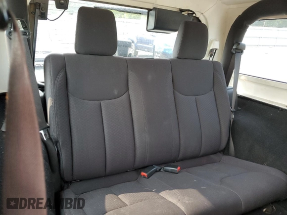 2013 Jeep Wrangler Sport z VIN 1C4AJWAG5DL671491, wystawiony jako Copart lot #59306745 z przebiegiem 111 778 mil mil oraz Szkoda całkowita • Salvage title. Historia ofert i sprzedaży dostępna na DreamBid. Obrazek 10.
