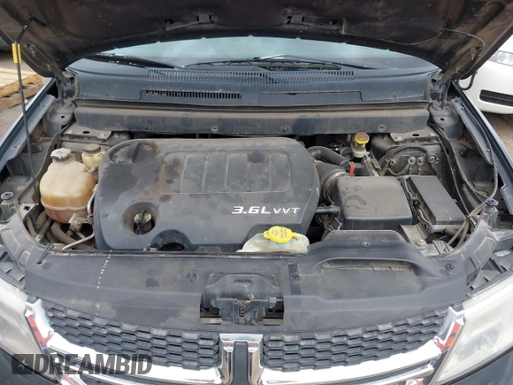 2014 Dodge Journey SXT with VIN 3C4PDCBG1ET127798, listed as a IAAI auction lot 41799898 with 178,873 mi miles and . Bid and sale history available at DreamBid. Image 10.
