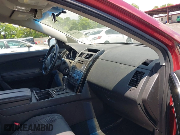 2014 Mazda CX-9 Touring with VIN JM3TB2CA7E0427214, listed as a IAAI auction lot 42175140 with 182,091 mi miles and . Bid and sale history available at carsss.com. Image 5.