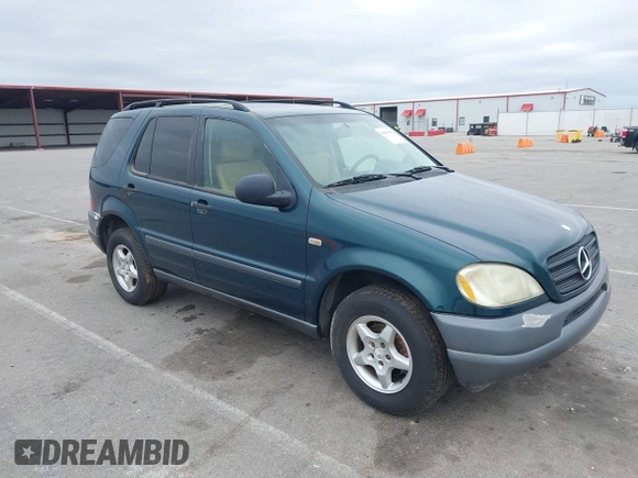 1999 Mercedes-Benz M 320/430/500 with VIN 4JGAB54E8XA055359, listed as a IAAI auction lot 41808170 with 161,573 mi miles and . Bid and sale history available at DreamBid. Image 1.