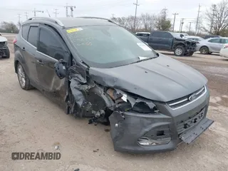 2016 Ford Escape Titanium with VIN 1FMCU0J9XGUC58149, listed as a IAAI auction lot 41739005 with 111,594 mi miles. Bid and sale history available at carsss.com. Image 1.