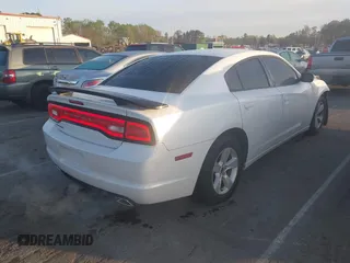 2014 Dodge Charger SE with VIN 2C3CDXBG7EH322291, listed as a IAAI auction lot 41925215 with 169,236 mi miles and . Bid and sale history available at carsss.com. Image 4.
