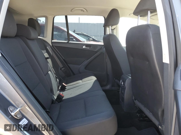 2012 Volkswagen Tiguan SE z VIN WVGAV7AX2CW004364, wystawiony jako Copart lot #55408655 z przebiegiem 271 198 mil mil oraz Szkoda całkowita • Salvage title. Historia ofert i sprzedaży dostępna na DreamBid. Obrazek 11.