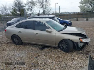 2009 Hyundai Azera Limited z VIN KMHFC46FX9A343230, wystawiony jako IAAI lot #42107823 z przebiegiem 26 319 mil mil oraz . Historia ofert i sprzedaży dostępna na DreamBid. Obrazek 14.