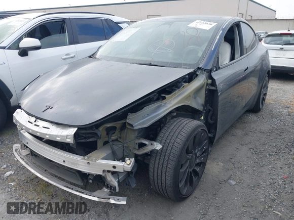 2023 Tesla Model Y Performance z VIN 7SAYGDEF6PF774965, wystawiony jako IAAI lot #41655550 z przebiegiem 33 824 mil mil oraz . Historia ofert i sprzedaży dostępna na DreamBid. Obrazek 19.