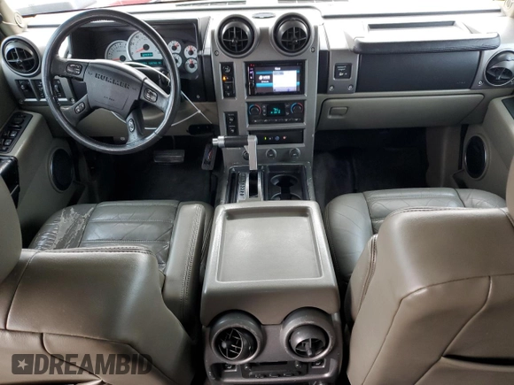 2003 Hummer H2 z VIN 5GRGN23U43H137876, wystawiony jako Copart lot #48081145 z przebiegiem 128 703 mil mil oraz Tytuł czysty. Historia ofert i sprzedaży dostępna na DreamBid. Obrazek 8.