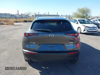 2022 Mazda CX-30 S Select z VIN 3MVDMBBL0NM415511, wystawiony jako IAAI lot #41513247 z przebiegiem Nie podano mil oraz . Historia ofert i sprzedaży dostępna na DreamBid. Obrazek 17.
