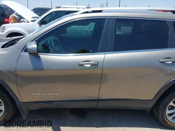 2019 Jeep Cherokee Latitude with VIN 1C4PJLCB7KD365667, listed as a IAAI auction lot 42504207 with 68,106 mi miles and . Bid and sale history available at DreamBid. Image 14.