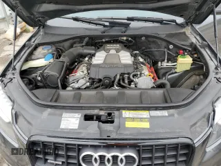 2015 Audi Q7 S line Prestige z VIN WA1DGAFEXFD030009, wystawiony jako Copart lot #53810365 z przebiegiem 90 421 mil mil oraz Szkoda całkowita • Salvage title. Historia ofert i sprzedaży dostępna na DreamBid. Obrazek 12.