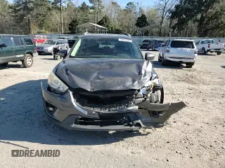 2014 Mazda CX-5 Touring with VIN JM3KE4CY0E0421878, listed as a Copart auction lot 49475805 with 138,074 mi miles and Salvage Title. Bid and sale history available at carsss.com. Image 11.