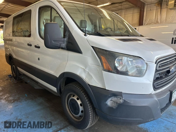 2016 Ford Transit Cargo z VIN 1FTYE1YM9GKB15647, wystawiony jako IAAI lot #42575776 z przebiegiem 235 520 mil mil oraz . Historia ofert i sprzedaży dostępna na DreamBid. Obrazek 14.