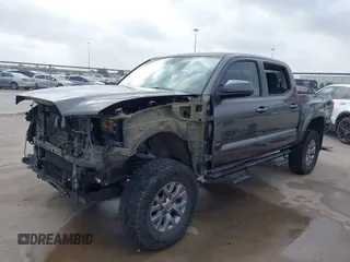 2017 Toyota Tacoma SR5 with VIN 5TFAZ5CN4HX047095, listed as a IAAI auction lot 41951364 with 127,706 mi miles and . Bid and sale history available at DreamBid. Image 2.
