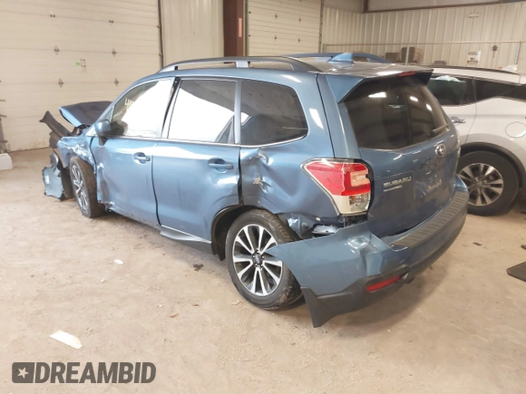 2018 Subaru Forester Premium with VIN JF2SJGECXJH606668, listed as a IAAI auction lot 41879710 with 64,910 mi miles. Bid and sale history available at carsss.com. Image 3.