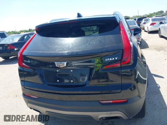 2019 Cadillac XT4 FWD Premium Luxury z VIN 1GYFZCR48KF141478, wystawiony jako IAAI lot #41988092 z przebiegiem 53 970 mil mil oraz . Historia ofert i sprzedaży dostępna na DreamBid. Obrazek 16.