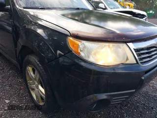 2009 Subaru Forester X with VIN JF2SH63619H738409, listed as a IAAI auction lot 42428672 with 190,636 mi miles and . Bid and sale history available at DreamBid. Image 12.