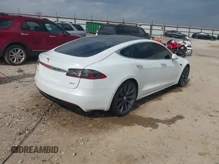 2017 Tesla Model S 100D z VIN 5YJSA1E29HF204797, wystawiony jako IAAI lot #41760296 z przebiegiem 92 587 mil mil oraz . Historia ofert i sprzedaży dostępna na DreamBid. Obrazek 4.