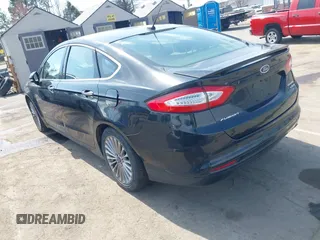 2013 Ford Fusion Titanium Hybrid with VIN 3FA6P0RU7DR355481, listed as a IAAI auction lot 41814003 with 177,789 mi miles. Bid and sale history available at carsss.com. Image 3.