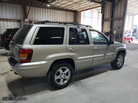 2003 Jeep Grand Cherokee Limited with VIN 1J4GW58NX3C572555, listed as a Copart auction lot 80675454 with 174,894 mi miles and Salvage Title. Bid and sale history available at carsss.com. Image 3.