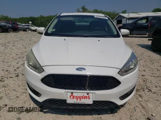 2015 Ford Focus SE with VIN 1FADP3F28FL332899, listed as a Copart auction lot 60055185 with 76,948 mi miles and Clean title. Bid and sale history available at DreamBid. Image 5.