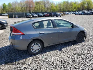 2010 Honda Insight LX z VIN JHMZE2H59AS000085, wystawiony jako Copart lot #54932975 z przebiegiem 218 961 mil mil oraz Szkoda całkowita • Salvage title. Historia ofert i sprzedaży dostępna na DreamBid. Obrazek 3.