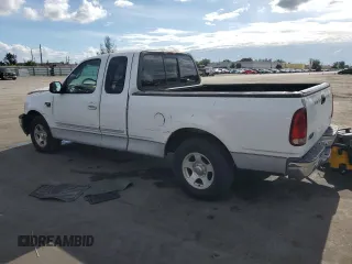 2000 Ford F-150 XL with VIN 1FTRX17W2YNB05575, listed as a Copart auction lot 86606934 with 0 mi miles and Salvage Title. Bid and sale history available at carsss.com. Image 2.
