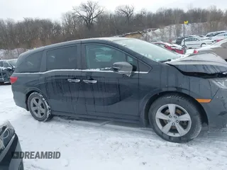 2018 Honda Odyssey EX-L z VIN 5FNRL6H79JB012735, wystawiony jako IAAI lot #41552799 z przebiegiem 29 253 mil mil oraz . Historia ofert i sprzedaży dostępna na DreamBid. Obrazek 13.