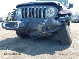 2022 Jeep Wrangler Unlimited Sahara with VIN 1C4HJXEM7NW206585, listed as a IAAI auction lot 42102516 with 10,769 mi miles and . Bid and sale history available at DreamBid. Image 18.