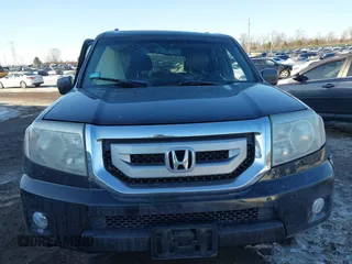 2009 Honda Pilot EX-L with VIN 5FNYF48649B026889, listed as a IAAI auction lot 41643289 with 121,511 mi miles and . Bid and sale history available at carsss.com. Image 12.