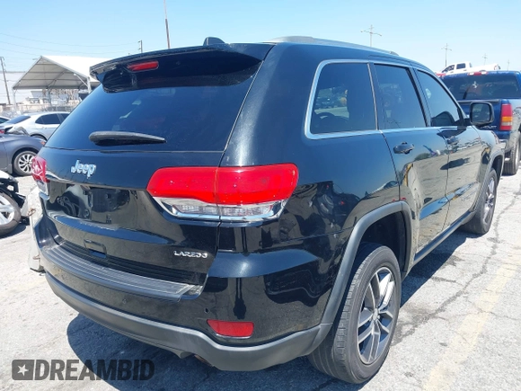 2018 Jeep Grand Cherokee Laredo E z VIN 1C4RJEAG9JC131344, wystawiony jako IAAI lot #42218060 z przebiegiem 126 639 mil mil oraz . Historia ofert i sprzedaży dostępna na DreamBid. Obrazek 4.