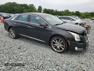 2013 Cadillac XTS Premium z VIN 2G61S5S37D9169935, wystawiony jako Copart lot #57515415 z przebiegiem 122 144 mil mil oraz Szkoda całkowita • Salvage title. Historia ofert i sprzedaży dostępna na DreamBid. Obrazek 4.