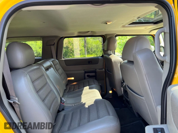 2003 Hummer H2 with VIN 5GRGN23UX3H112710, listed as a Copart auction lot 88229785 with 64,186 mi miles and Salvage Title. Bid and sale history available at carsss.com. Image 6.