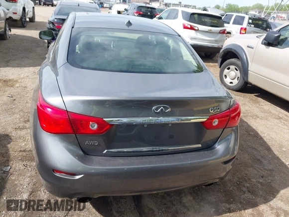 2015 Infiniti Q50 Premium z VIN JN1BV7AR1FM398047, wystawiony jako IAAI lot #42203862 z przebiegiem 104 002 mil mil oraz . Historia ofert i sprzedaży dostępna na DreamBid. Obrazek 16.