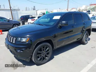 2017 Jeep Grand Cherokee 75th Anniversary with VIN 1C4RJEAG6HC956218, listed as a IAAI auction lot 42353950 with 113,398 mi miles and . Bid and sale history available at DreamBid. Image 19.