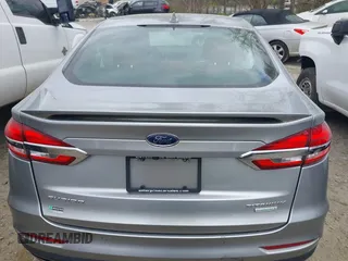 2020 Ford Fusion Titanium с VIN 3FA6P0K91LR128016, выставлен на аукционе IAAI как лот 41947905 с пробегом 79 622 миль миль и . История ставок и продаж доступна на DreamBid. Изображение 16.
