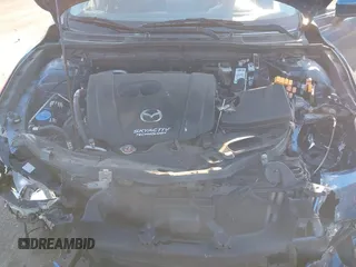 2017 Mazda 3 Touring with VIN 3MZBN1V74HM104034, listed as a IAAI auction lot 41823286 with 53,282 mi miles and . Bid and sale history available at DreamBid. Image 10.