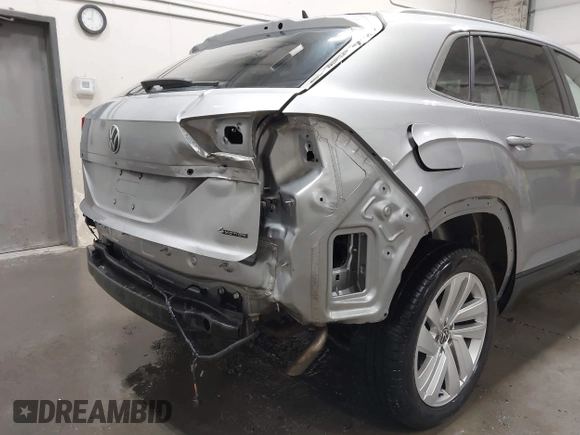 2023 Volkswagen Atlas SE z VIN 1V2KC2CA6PC210593, wystawiony jako IAAI lot #41957633 z przebiegiem 34 801 mil mil oraz . Historia ofert i sprzedaży dostępna na DreamBid. Obrazek 6.