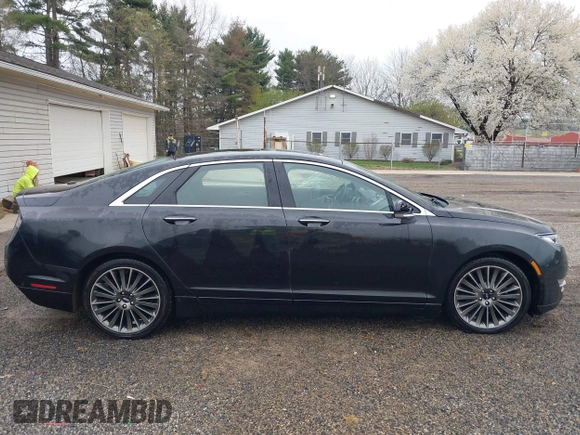 2014 Lincoln MKZ Hybrid with VIN 3LN6L2LU1ER821588, listed as a IAAI auction lot 42017129 with 151,339 mi miles and . Bid and sale history available at DreamBid. Image 12.