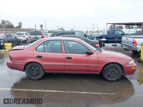 1997 Geo Prizm LSi with VIN 1Y1SK5265VZ457659, listed as a IAAI auction lot 41778510 with 149,073 mi miles. Bid and sale history available at carsss.com. Image 13.