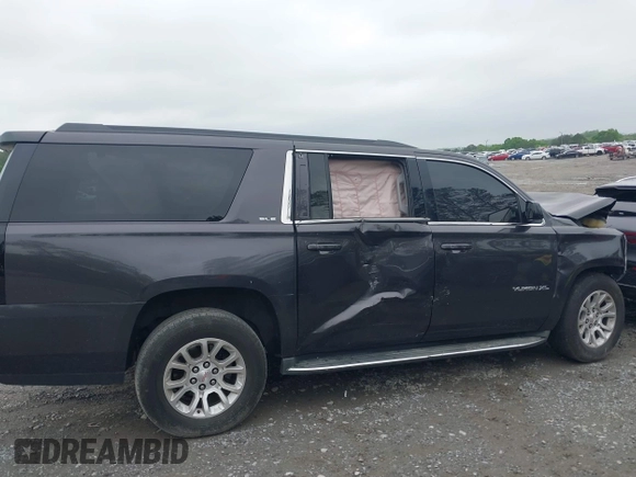 2015 GMC Yukon XL SLE z VIN 1GKS1GKC8FR507436, wystawiony jako IAAI lot #42113696 z przebiegiem Nie podano mil oraz . Historia ofert i sprzedaży dostępna na DreamBid. Obrazek 13.
