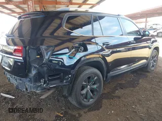 2018 Volkswagen Atlas SE with VIN 1V2CP2CA1JC600999, listed as a IAAI auction lot 42339421 with 133,490 mi miles and . Bid and sale history available at DreamBid. Image 4.