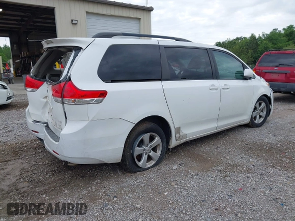 2011 Toyota Sienna LE AAS with VIN 5TDKK3DC6BS091557, listed as a IAAI auction lot 42170157 with 398,019 mi miles and . Bid and sale history available at DreamBid. Image 4.