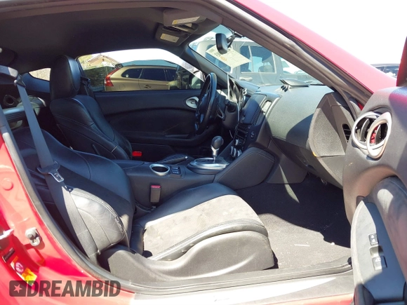 2009 Nissan 370Z Touring with VIN JN1AZ44E69M405179, listed as a IAAI auction lot 41762303 with 132,853 mi miles and . Bid and sale history available at DreamBid. Image 5.