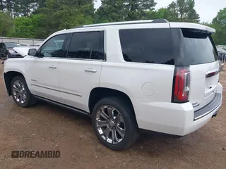 2016 GMC Yukon Denali with VIN 1GKS1CKJ7GR237852, listed as a IAAI auction lot 41944398 with 65,703 mi miles. Bid and sale history available at carsss.com. Image 3.